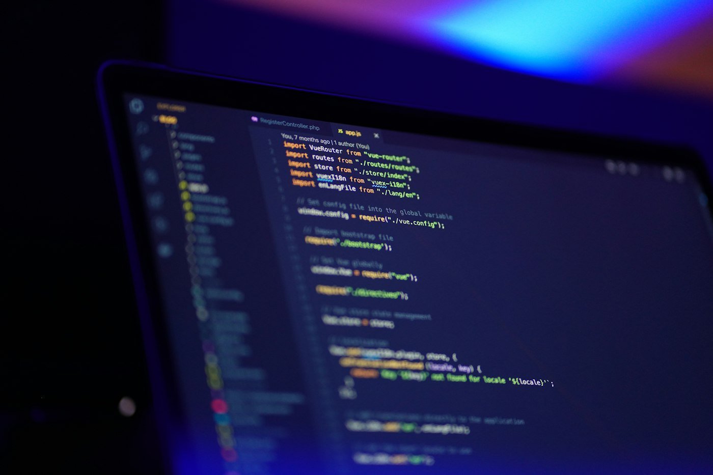 Laptop screen showing colorful website code for technical SEO