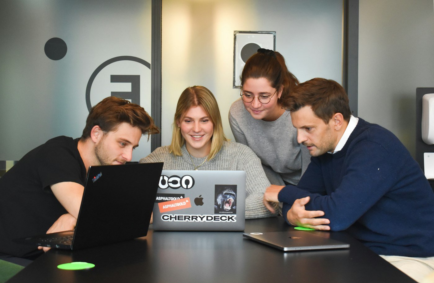 Marketing team reviewing low-competition keywords together